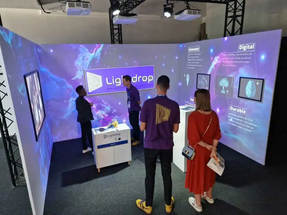 Convention booth with video mapping, Lightdrop logo